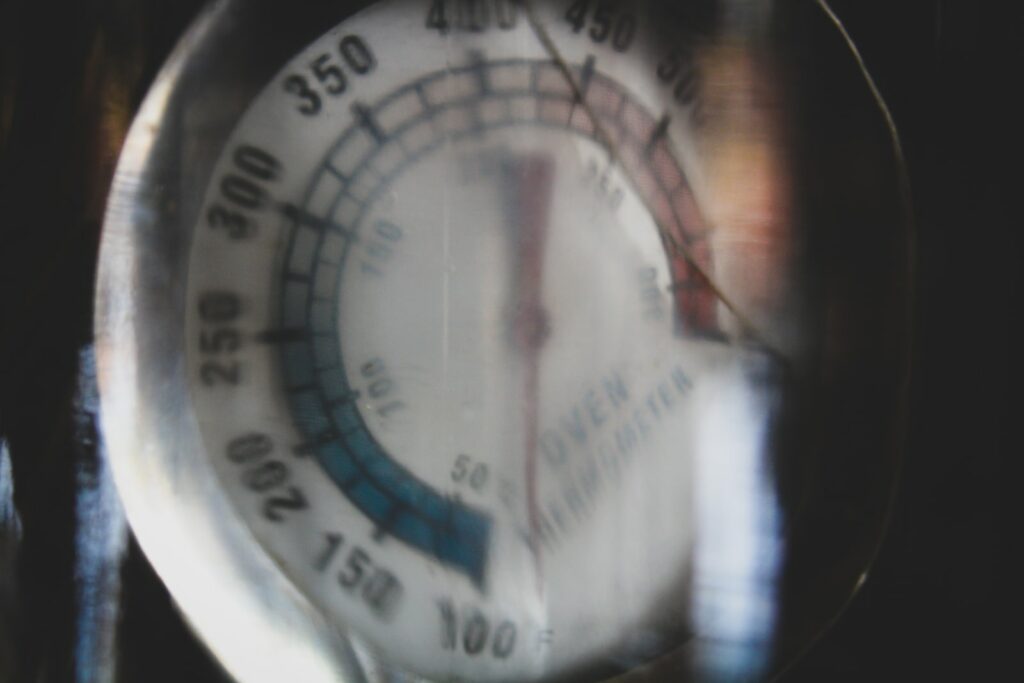white and black analog gauge